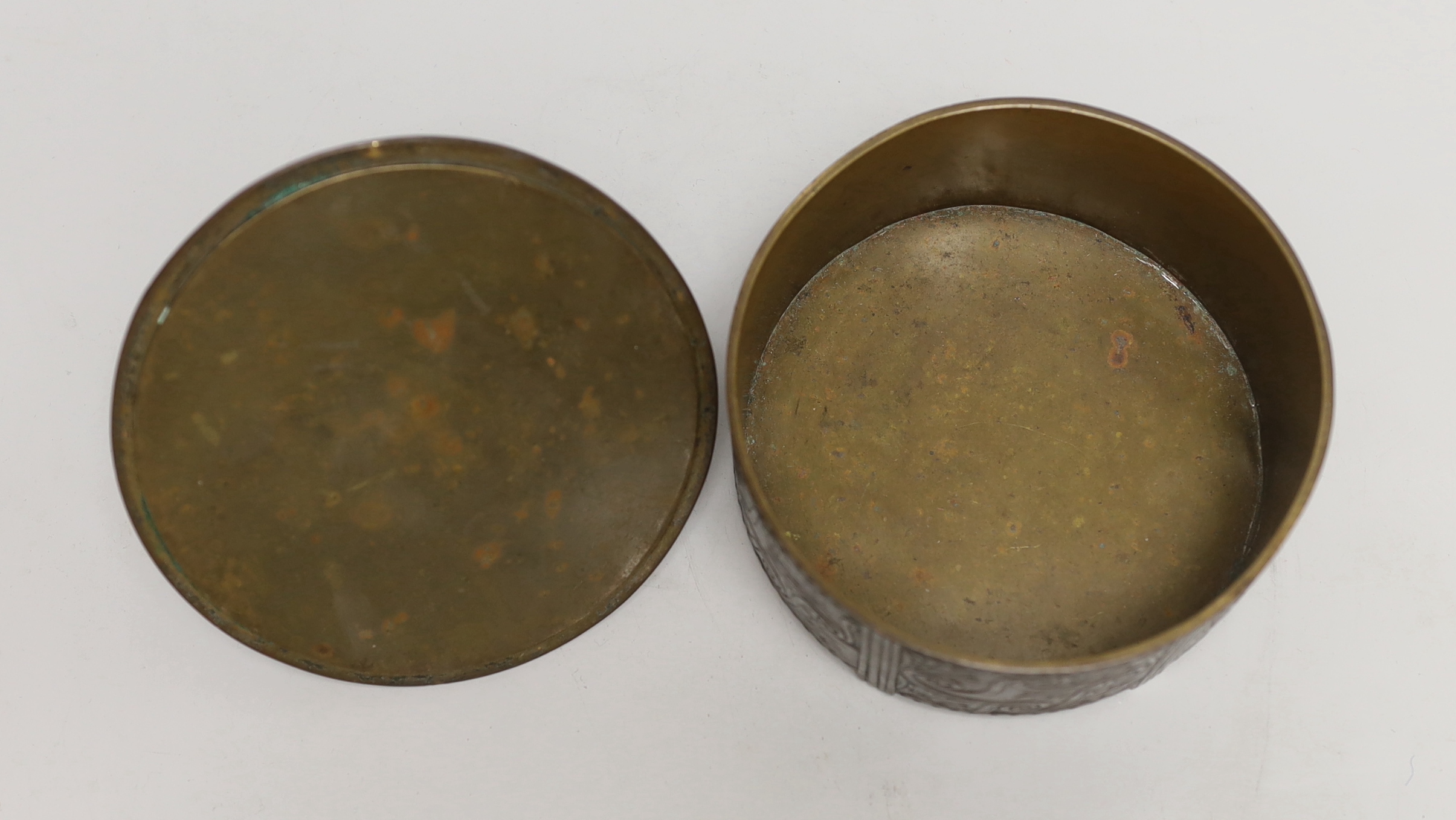 An Art Deco bronze and ivory circular box and cover, 12cm. Ivory Submission reference JQQU4ECR